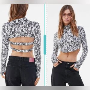 Eye Candy T-shirt cropped newspaper print strappy back long sleeve junior size L